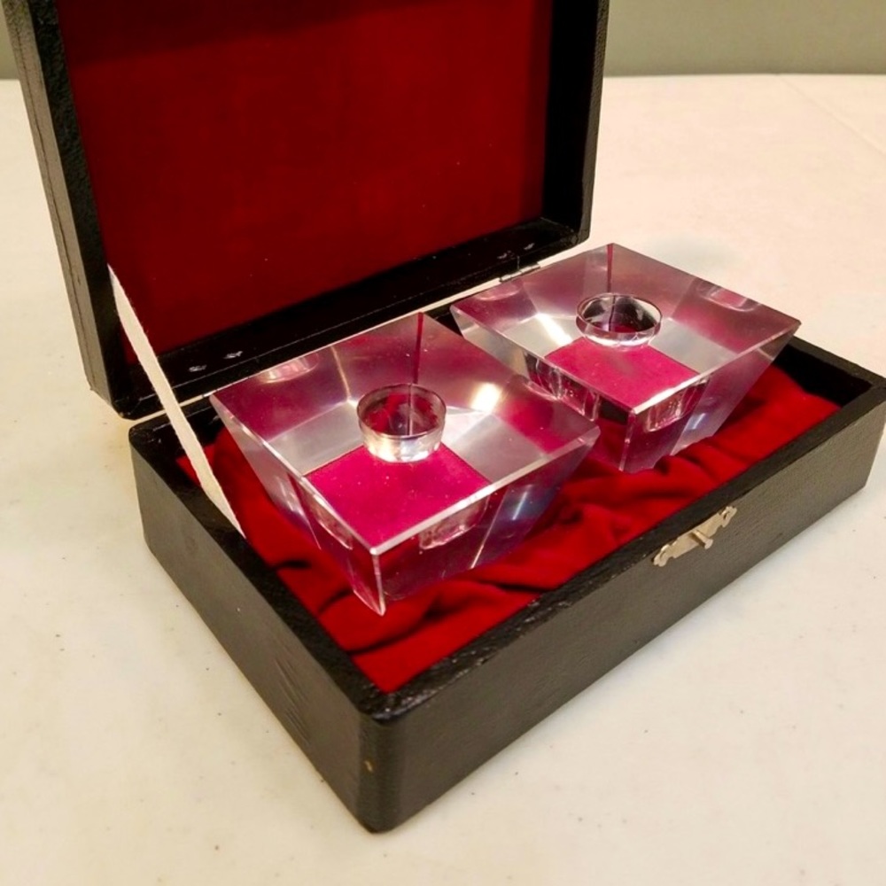 Pair of vintage pyramidal crystal glass candlesticks in a velvet lined case.